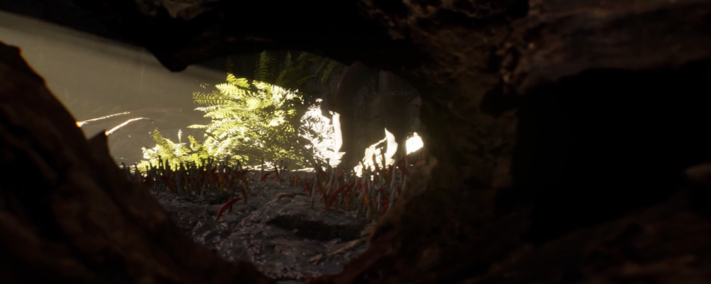Break Human in-game screenshot: a lush fern seen from inside a dark cave